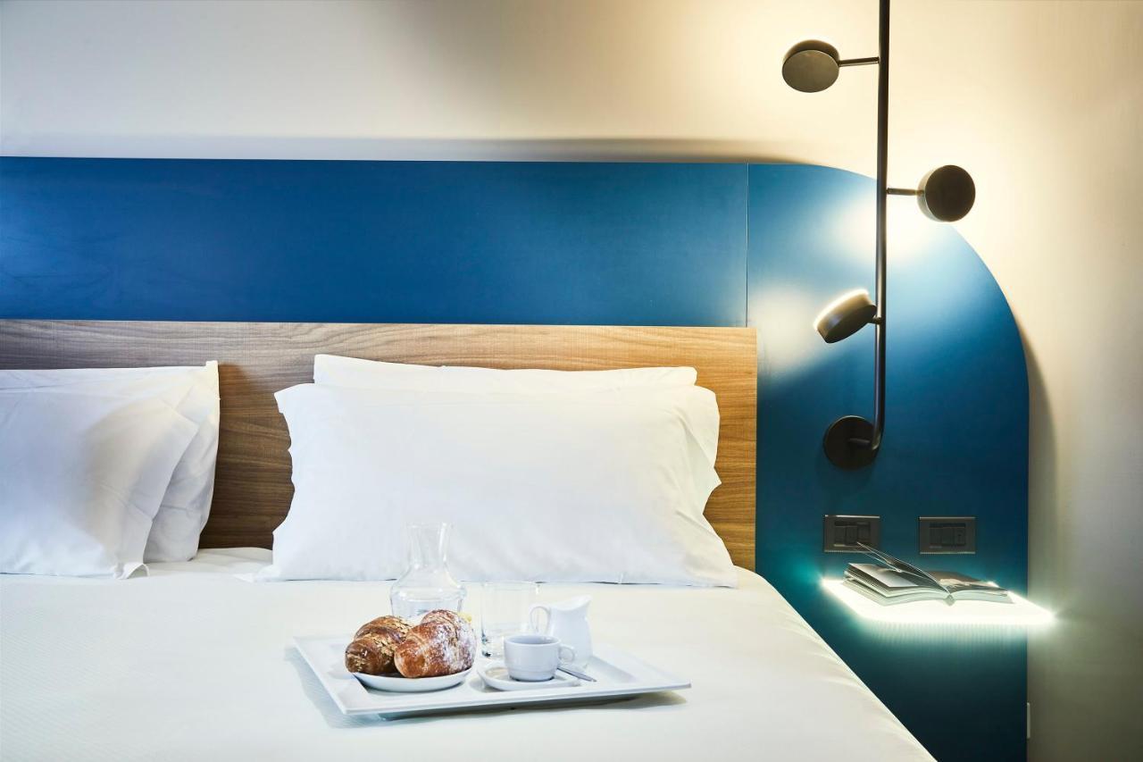 มิลาน อัสซาโก Hotel อาซซาโก ภายนอก รูปภาพ